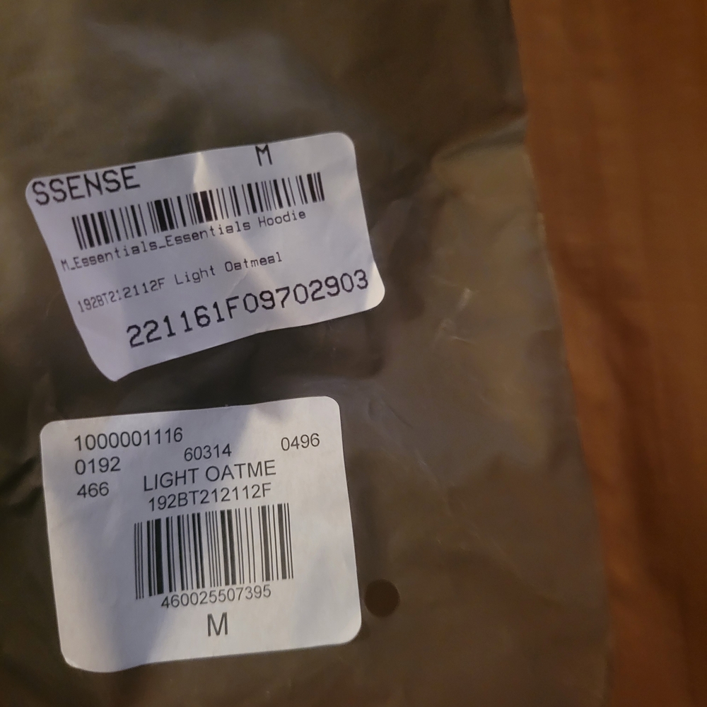 Essentials Light Gray Hoodie with Black Logo